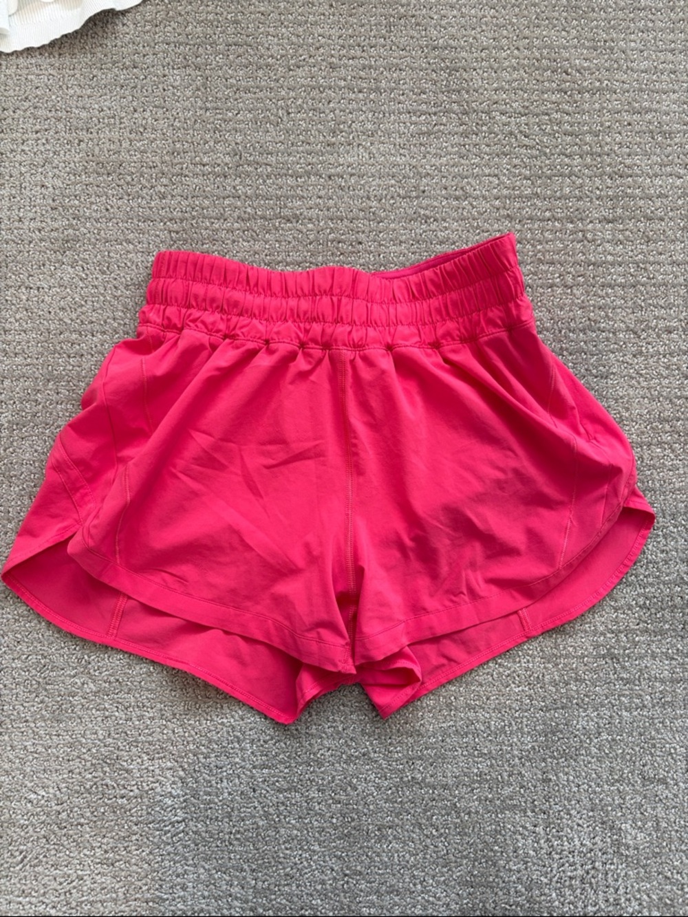 Women’s bright pink lululemon track that shorts